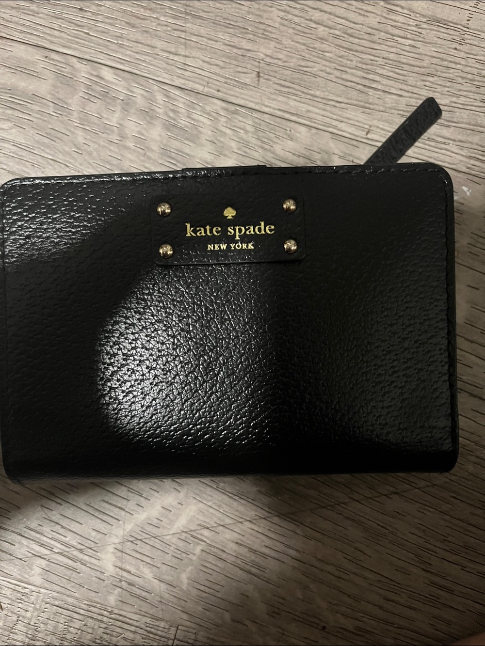 kate spade Black Leather Zip-Around Wallet with Gold Plaque